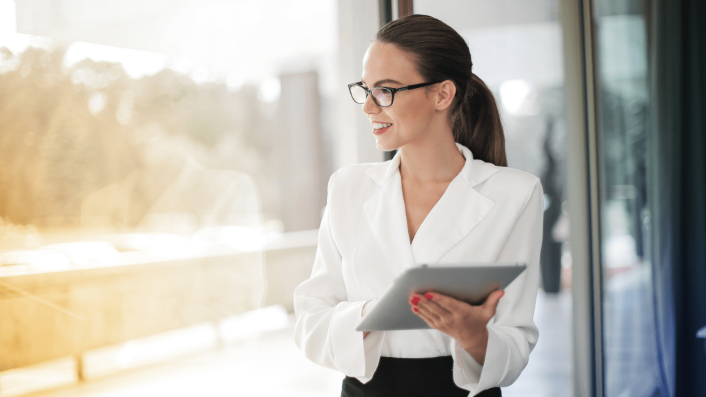 professional woman looking outside window