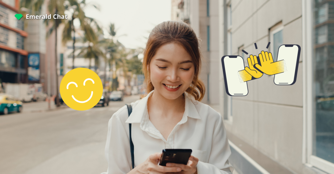 Smiling woman looking at her phone, symbolizing the positive experience and benefits of using online chat rooms.