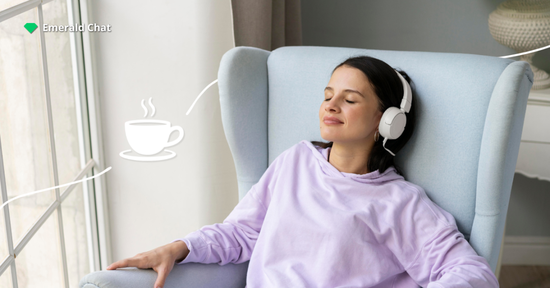A woman thinking deeply while sitting on a couch with a laptop.