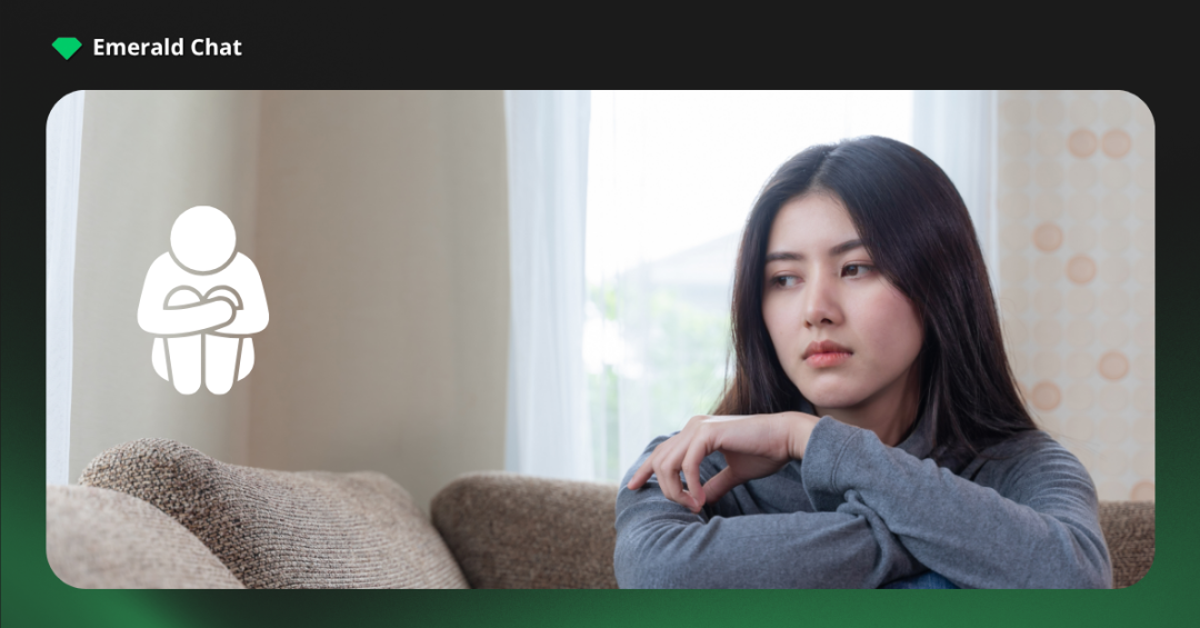 Woman sitting alone and looking thoughtful, capturing the emotional weight and loneliness that can come with outgrowing friendships quietly.